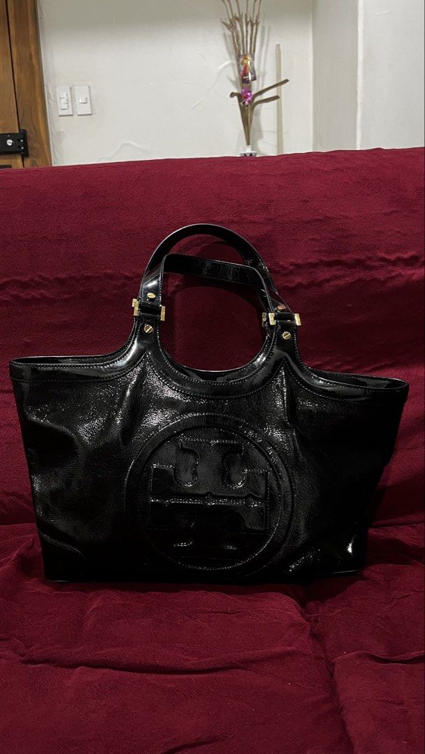 Tory Burch Black Leather Bombe Tote Bag (Category: Luxury Bags & Wallets) located in Quezon City. Submitted by xoxothea (Listing ID 1457327707, Image 2). Description: - rfs: wfh na, also need more funds for my set up 🥹 - was a pasabuy last december from the US, bought at 29k, will come with a dust bag - she’s my baby, super well taken care of :( - price is nego as long as u take care of her 😭.