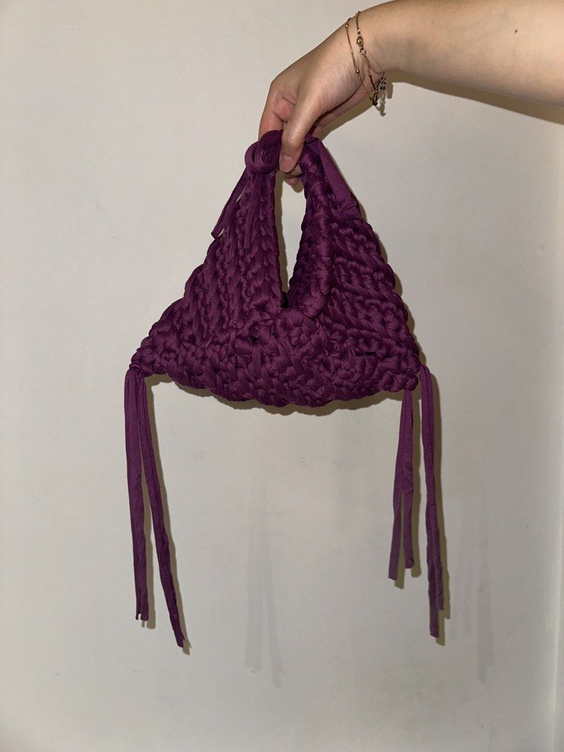 Triangle Hand Bag Crochet (handmade) - Ube Color (Category: Purses & Pouches) located in San Juan City. Submitted by channiesara3 (Listing ID 1457287009, Image 3). Description: Handmade crocheted hand bag made by instag: @niks_knackshop Inspired by LOOSENDS crochet - Material: T-shirt yarn (smooth but stretchy material) - Color: Violet/Ube - Size: small (check photos with iPhone 14 pro max inside the bag as reference) - fairly spacious for a smal