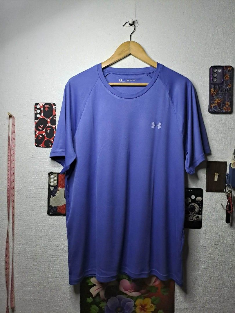Under Armour Tech 2.0 (Category: Activewear) located in Manila. Submitted by yaseen__73 (Listing ID 1457317450, Image 1). Description: Under Armour Tech 2.0 short-sleeve athletic t-shirt in a vibrant purple-blue colorway featuring a classic crew neckline and the brand's signature silver logo on the chest. Wearing Size : 3XL on Tag Dimensions : See Photo Color Rate : 10/10 No Issue Brand New Condition Ready To Wear 🔥🔥🔥 PRE - OWNED 🔥🔥🔥 ✅GCash