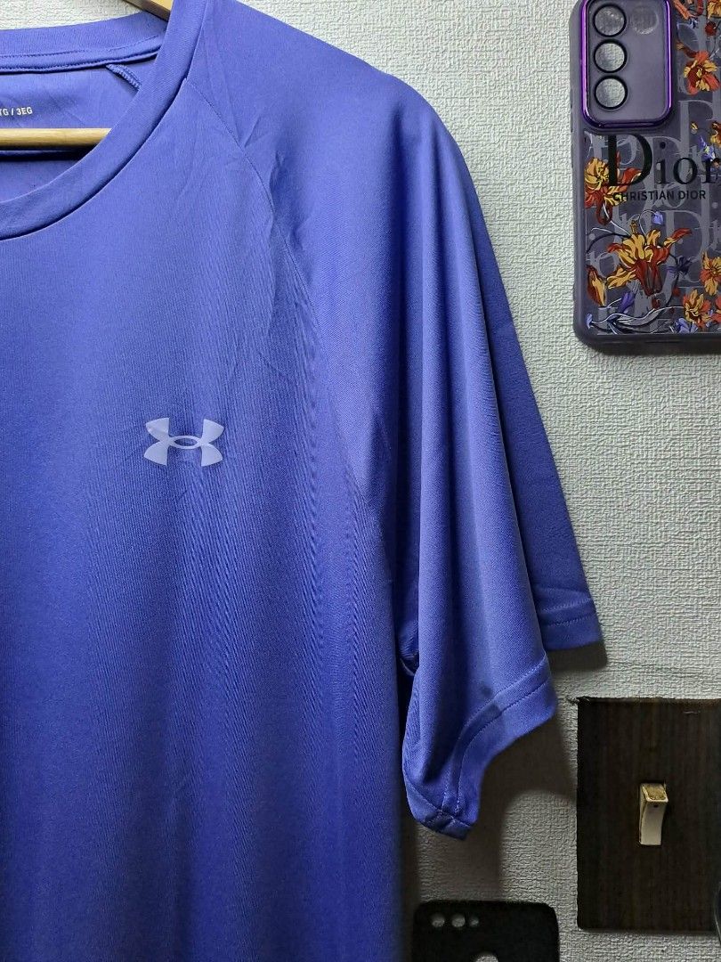 Under Armour Tech 2.0 (Category: Activewear) located in Manila. Submitted by yaseen__73 (Listing ID 1457317450, Image 2). Description: Under Armour Tech 2.0 short-sleeve athletic t-shirt in a vibrant purple-blue colorway featuring a classic crew neckline and the brand's signature silver logo on the chest. Wearing Size : 3XL on Tag Dimensions : See Photo Color Rate : 10/10 No Issue Brand New Condition Ready To Wear 🔥🔥🔥 PRE - OWNED 🔥🔥🔥 ✅GCash