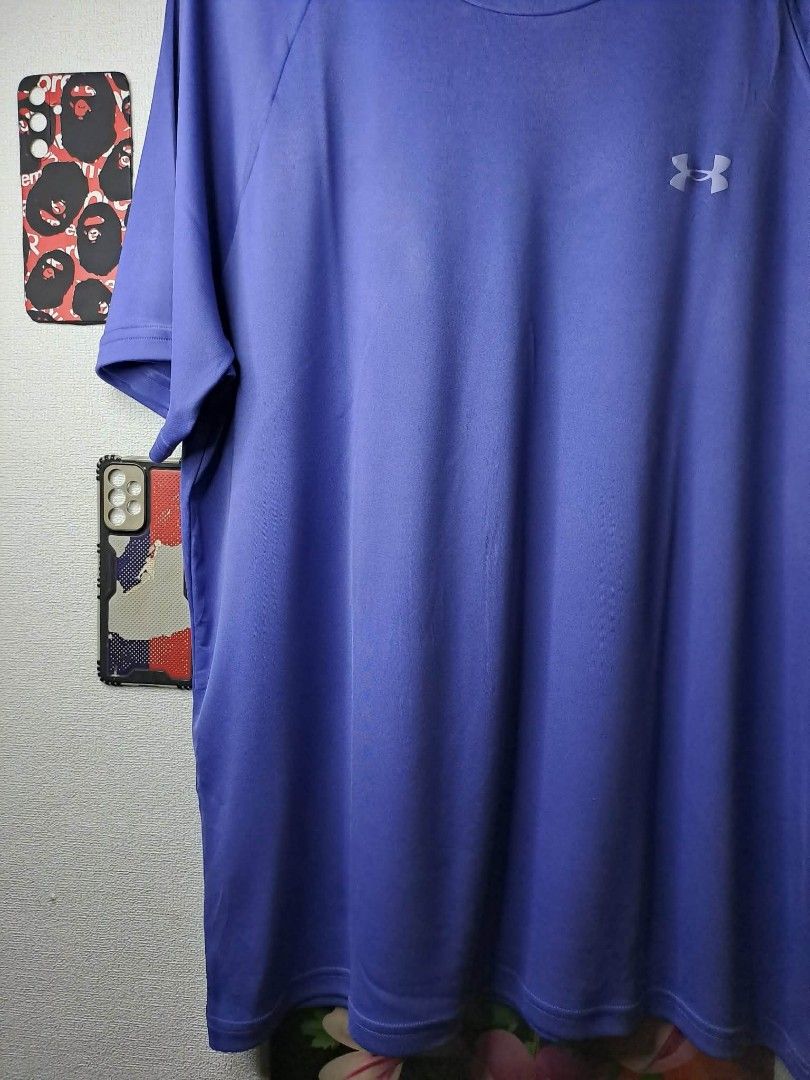 Under Armour Tech 2.0 (Category: Activewear) located in Manila. Submitted by yaseen__73 (Listing ID 1457317450, Image 3). Description: Under Armour Tech 2.0 short-sleeve athletic t-shirt in a vibrant purple-blue colorway featuring a classic crew neckline and the brand's signature silver logo on the chest. Wearing Size : 3XL on Tag Dimensions : See Photo Color Rate : 10/10 No Issue Brand New Condition Ready To Wear 🔥🔥🔥 PRE - OWNED 🔥🔥🔥 ✅GCash