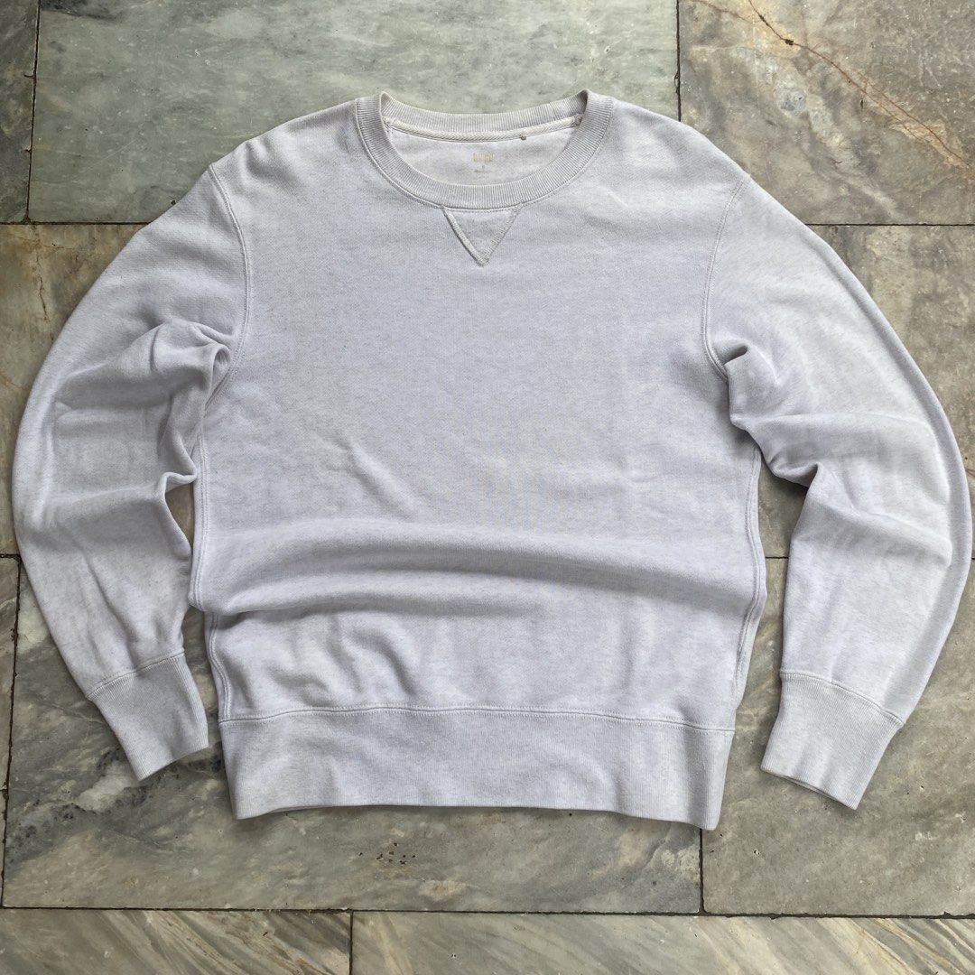 UNIQLO Crewneck Sweatshirt Light Grey (Category: Coats, Jackets and Outerwear) located in Manila. Submitted by vashoffdwork (Listing ID 1457303003, Image 1). Description: - Grey UNIQLO sweatshirt - Crewneck style with V-insert detail - Size: Medium (M) - Made in China - Ideal for casual outfits.