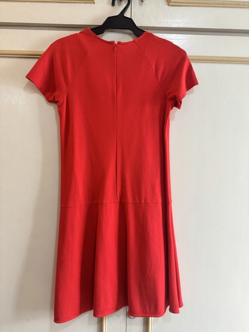 Uniqlo Red Dress (Category: Dresses) located in Manila. Submitted by hakunashop (Listing ID 1457194279, Image 3). Description: Uniqlo Red Dress Classic red short-sleeve dress with a flattering fit-and-flare silhouette. Simple, comfortable, and easy to dress up or down. Condition: Preloved, in good condition Size: Small Brand: Uniqlo Actual photos included. Worn photo for fit reference..