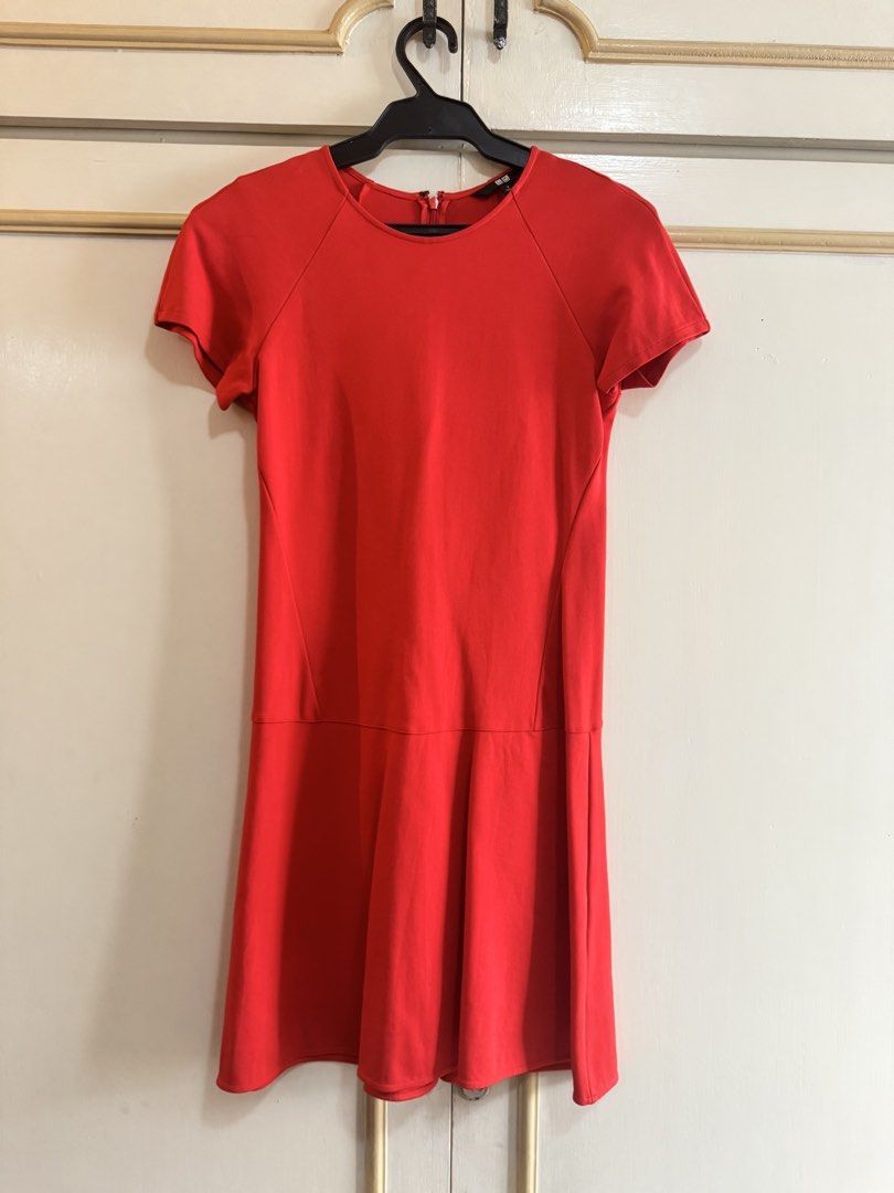 Uniqlo Red Dress (Category: Dresses) located in Manila. Submitted by hakunashop (Listing ID 1457194279, Image 2). Description: Uniqlo Red Dress Classic red short-sleeve dress with a flattering fit-and-flare silhouette. Simple, comfortable, and easy to dress up or down. Condition: Preloved, in good condition Size: Small Brand: Uniqlo Actual photos included. Worn photo for fit reference..