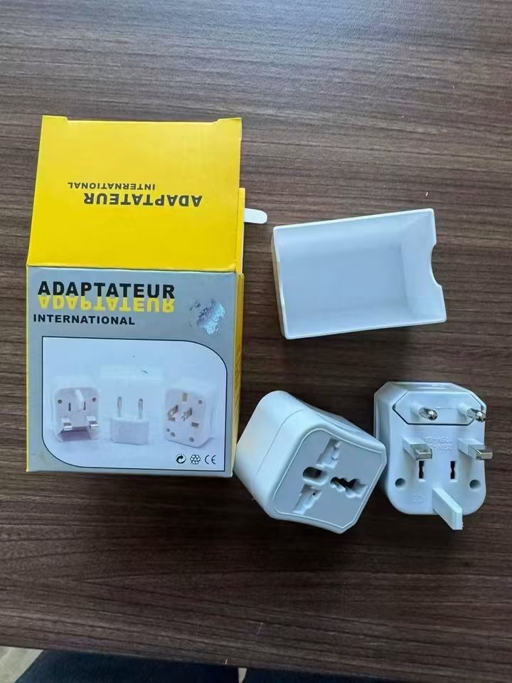 Universal Travel Adapter for International Use (Category: Cables & Adaptors) located in Manila. Submitted by iliasjen3082126 (Listing ID 1457259862, Image 1). Description: - Universal travel adapter, perfect for international trips. - Compatible with American, Australian, European, and British plug standards. - Compact and easy to carry, fits perfectly in your luggage. - Supports a maximum voltage of 250V and a maximum current of 10A. - Ideal for