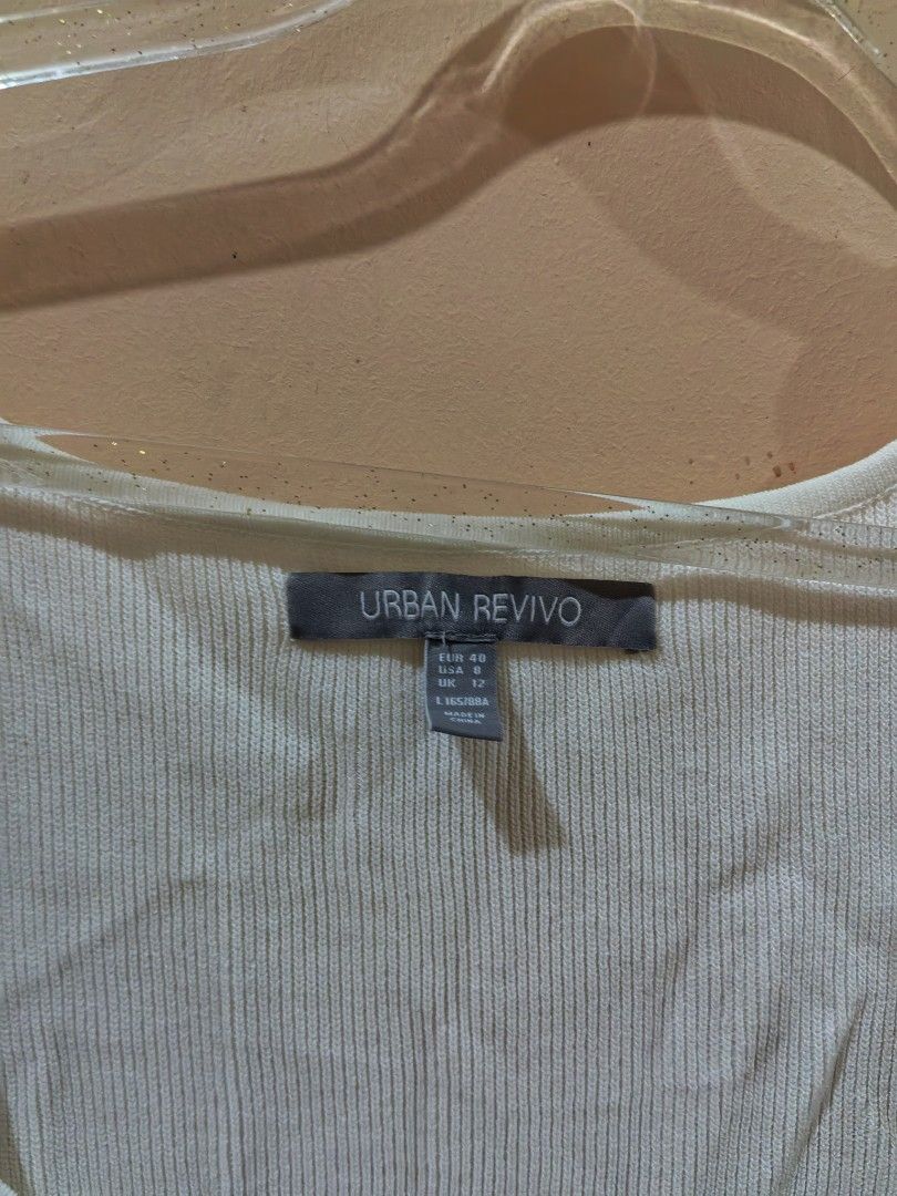Urban Revivo Knittes Top (Category: Blouses) located in Las Pinas. Submitted by jgcollection_ (Listing ID 1457265188, Image 2). Description: - Urban Revivo white knit top - Size: L ( pwede din sa Med) - Features: - Square neckline - Puff sleeves - Ruched front detail - Scoop back -Brandnew.