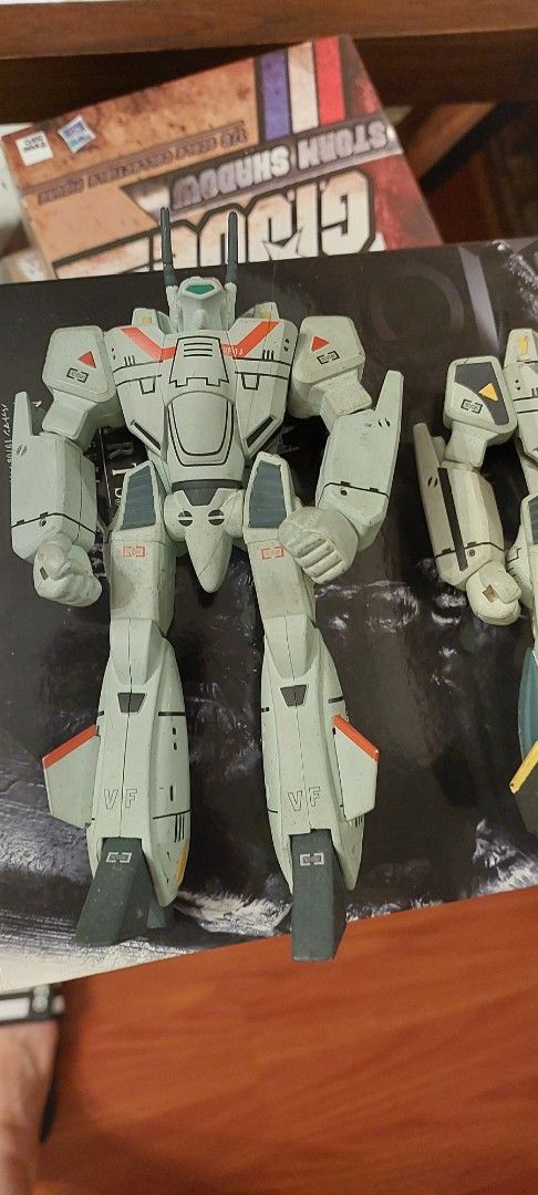 VF-1 Valkyrie Toy Figures (Category: Figurines & Statues) located in Quezon City. Submitted by donald_draper (Listing ID 1457266812, Image 3). Description: - Two (2) VF-1 Valkyrie toy figures - One in Fighter Mode, one in Battroid Mode - Both figures are grey with skull and crossbones decals - Perfect for collectors.