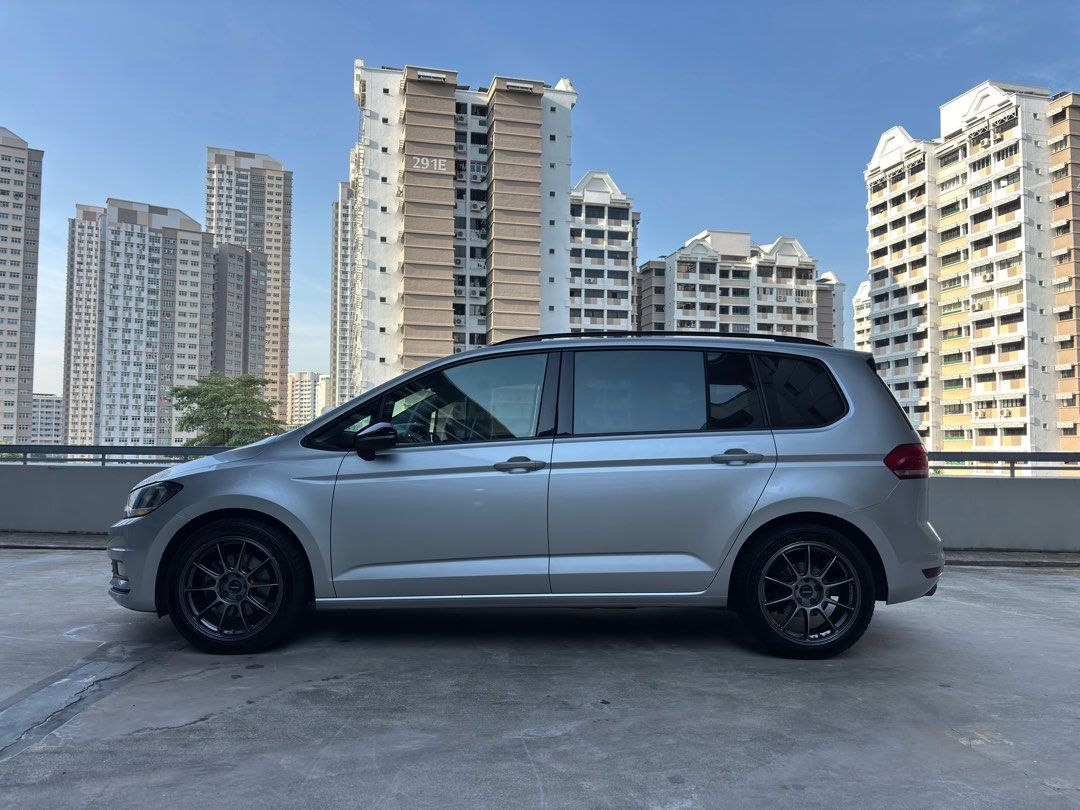 Volkswagen Touran 1.4A TSI Comfortline Panoramic Roof Auto (Category: Used Cars) located in Singapore. Submitted by unlimitedsportsgear (Listing ID 1457240938, Image 3). Description: WA me at Ryan, 9 two two two, eight eight two 7 Sporty and stylish with black grilles, roof rack, 18” Wedsport TC105X wheels and R-Line shifter. Very well maintained and serviced on time, with 24/7 sheltered parking to keep the car in pristine condition. Viewing avai