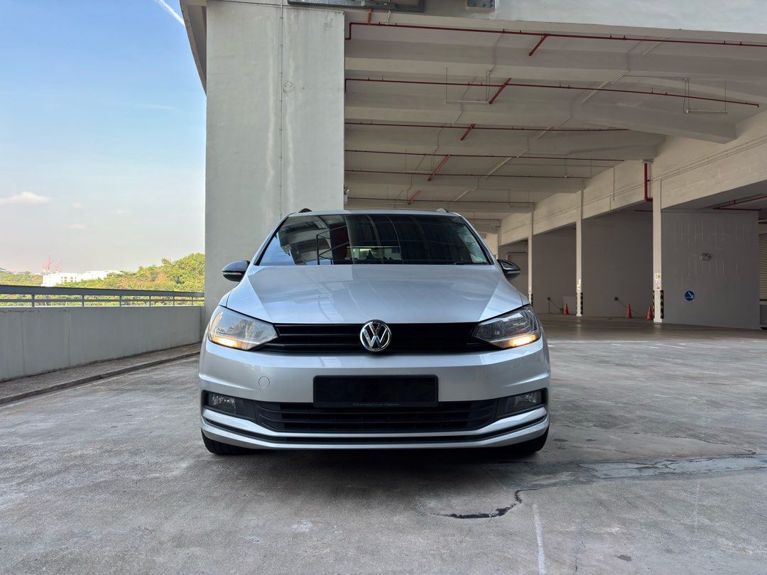 Volkswagen Touran 1.4A TSI Comfortline Panoramic Roof Auto (Category: Used Cars) located in Singapore. Submitted by unlimitedsportsgear (Listing ID 1457240938, Image 2). Description: WA me at Ryan, 9 two two two, eight eight two 7 Sporty and stylish with black grilles, roof rack, 18” Wedsport TC105X wheels and R-Line shifter. Very well maintained and serviced on time, with 24/7 sheltered parking to keep the car in pristine condition. Viewing avai