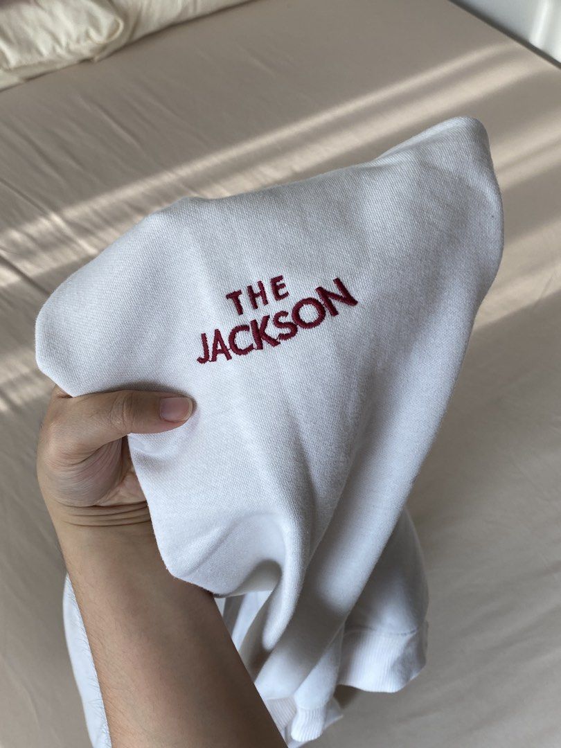 White Hoodie "The Jackson" (Category: Hoodies) located in Makati City. Submitted by dcltering_unicorn (Listing ID 1457320662, Image 2). Description: ♡ 𝙖𝙗𝙤𝙪𝙩 𝙩𝙝𝙚 𝙞𝙩𝙚𝙢 ♡ ✿ brand: WVUR Project ✿ size: length: 22 in ; width: 22 in ✿ color: white ✿ style: hoodie, “The Jackson” embroidery on sleeve and song quote across chest ✿ issues: minor stains and subtle signs of usage, but adds character to the piece ✿ rfs: decluttering, too many jack