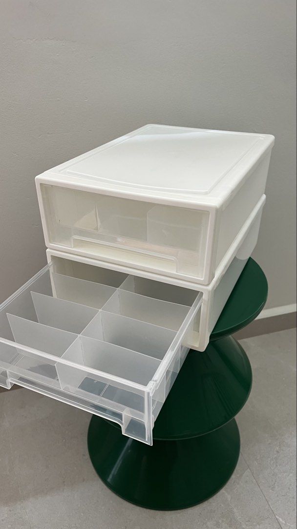 White Stackable Storage Drawers with Compartments (Category: Storage Boxes & Baskets) located in Singapore. Submitted by ian_so_common (Listing ID 1457220401, Image 3). Description: - Two white storage drawers - Stackable design - Internal dividers in each drawer - Ideal for organizing stationery, makeup, accessories, sock, undergarments, etc. - Helps keep desks and vanities tidy - Easy to open and close - socks for scale, not included - $5 each,