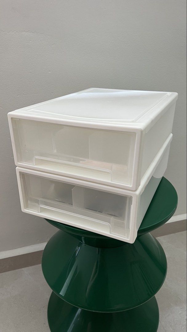 White Stackable Storage Drawers with Compartments (Category: Storage Boxes & Baskets) located in Singapore. Submitted by ian_so_common (Listing ID 1457220401, Image 1). Description: - Two white storage drawers - Stackable design - Internal dividers in each drawer - Ideal for organizing stationery, makeup, accessories, sock, undergarments, etc. - Helps keep desks and vanities tidy - Easy to open and close - socks for scale, not included - $5 each,