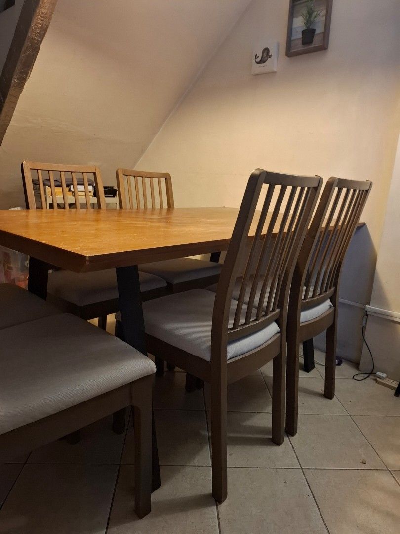 Wooden Dining Table (Table only, can fit 6) (Category: Tables & Sets) located in Las Pinas. Submitted by audiomd (Listing ID 1457217828, Image 2). Description: Wooden dining table with a warm wood tone. (Well used dining table) Metal rods as legs. RFS: Gifted a new dining set by family Size of table: 63in x 36 in x 34in (LWH) Pick up Las Pinas area.