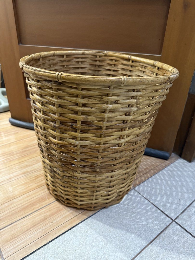 Woven Rattan Can / Laundry Basket (Category: Storage Boxes & Baskets) located in Mandaluyong City. Submitted by toby.yumi (Listing ID 1457271895, Image 1). Description: - Natural woven bamboo basket - Ideal for trash or laundry - Tapered shape for a stylish look - Sturdy and durable construction - Adds a rustic touch to your home decor.