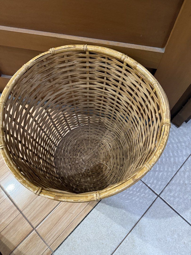 Woven Rattan Can / Laundry Basket (Category: Storage Boxes & Baskets) located in Mandaluyong City. Submitted by toby.yumi (Listing ID 1457271895, Image 3). Description: - Natural woven bamboo basket - Ideal for trash or laundry - Tapered shape for a stylish look - Sturdy and durable construction - Adds a rustic touch to your home decor.