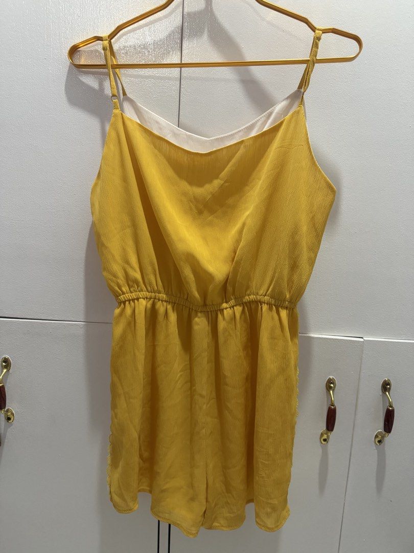 Yellow romper (Category: Rompers) located in Taguig. Submitted by monethambas (Listing ID 1457290336, Image 2). Description: Yellow & White Lace-Trim Spaghetti Strap Romper (Size M) ​Description: Brighten up your wardrobe with this casual, cute yellow and white romper! Perfect for summer outings, beach trips, or relaxed everyday wear. ​Key Details: ​Brand / Tag: MG 小象 ​Size: Medium (M) ​Color: Mustard / Bright Yellow with White contrast panels ​S