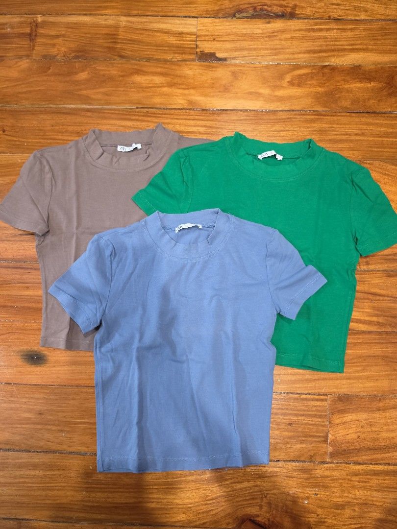 Zara Basic Mini T-shirts Bundle (3 pcs) in Small (Category: Shirts) located in Marikina City. Submitted by ddeclutter93 (Listing ID 1457233302, Image 1). Description: - Bundle of 3 Zara Basic T-shirts - Colors: Green, Blue, Brown - Size: S - Material: Comfortable, perfect for everyday wear - Great value bundle deal.