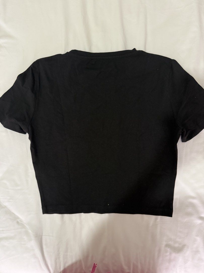 Zara Black Cropped T-Shirt (Category: Shirts) located in Muntinlupa City. Submitted by jtarchive (Listing ID 1457248199, Image 2). Description: - Brand: Zara - Color: Black - Style: Cropped T-shirt - Neckline: Crew neck - Sleeves: Short sleeves - Versatile and easy to style - Ideal for everyday wear.