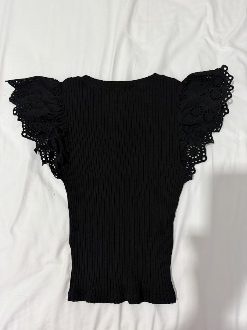 Zara Black Ribbed Top with Eyelet Puff Flutter Sleeves (Category: Blouses) located in Muntinlupa City. Submitted by jtarchive (Listing ID 1457258769, Image 3). Description: - Zara ribbed top - Size S - Cute eyelet flutter sleeves - Versatile: dress up or down - Comfortable and stylish.