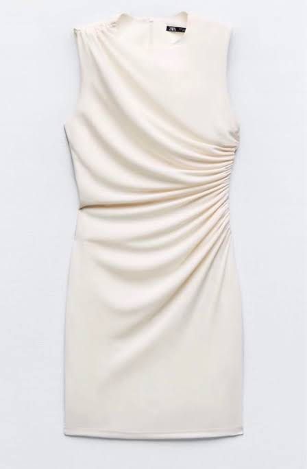 ZARA Ruched Midi Dress Cream (Category: Dresses) located in Manila. Submitted by shopmrld (Listing ID 1456936073, Image 1). Description: - ZARA cream midi dress - Size on tag : L - Runs small - Flattering ruched side detail - Zipper closure at the back - Used once only.