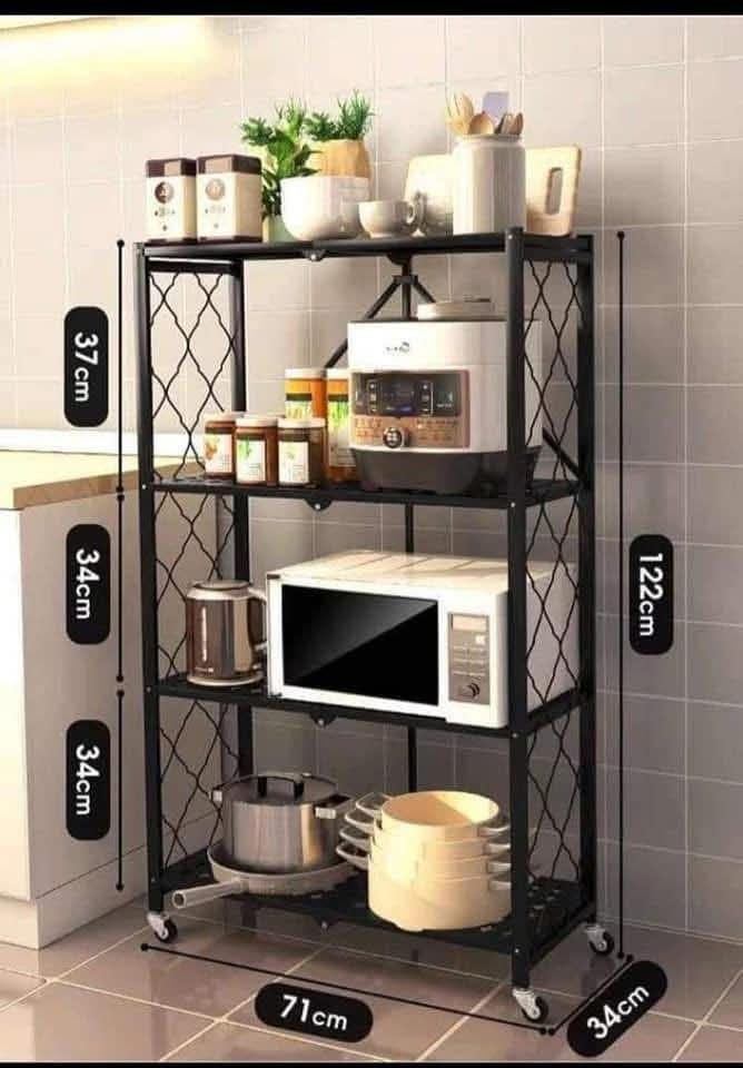 4-Tier Folding Kitchen Shelf Rack with Wheels (Category: Shelves, Cabinets & Racks) located in Manila. Submitted by jhonlexlim0517 (Listing ID 1457509248, Image 1). Description: - 4-Tier Folding Shelf - Ideal for Kitchen Storage (Microwave, Pots, Pans, etc.) - Built-in Wheels for Easy Mobility - Folds Flat for Compact Storage - Dimensions: 122cm (Height) x 71cm (Width) x 34cm (Depth) - Shelf Heights: 37cm, 34cm, 34cm.