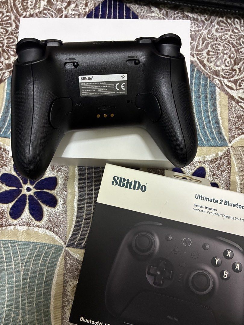 8BitDo Ultimate 2 Bluetooth Controller (Category: Controllers) located in Kuala Lumpur. Submitted by mhklrzl (Listing ID 1457456118, Image 2). Description: Condition 9/10 (open for nego) Compatible with - Nintendo Switch (Switch, Switch OLED, Switch Lite, Switch 2) - Windows PC (Windows 10 / Windows 11) - Steam Deck / SteamOS - macOS via Bluetooth/Wired *Not compatible with Playstations/Xbox.