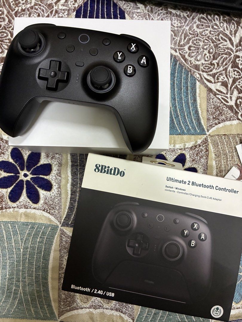 8BitDo Ultimate 2 Bluetooth Controller (Category: Controllers) located in Kuala Lumpur. Submitted by mhklrzl (Listing ID 1457456118, Image 1). Description: Condition 9/10 (open for nego) Compatible with - Nintendo Switch (Switch, Switch OLED, Switch Lite, Switch 2) - Windows PC (Windows 10 / Windows 11) - Steam Deck / SteamOS - macOS via Bluetooth/Wired *Not compatible with Playstations/Xbox.