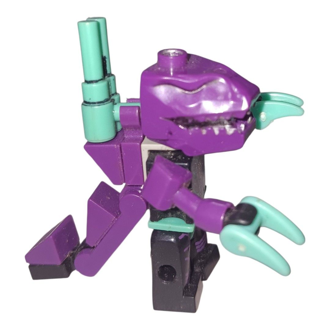 KRE-O Transformers Micro-Changer Trypticon mini-figure (Category: Lego & Building Sets) located in Paranaque City. Submitted by InquisiToyz (Listing ID 1457341822, Image 1). Description: Selling this collectible KRE-O Transformers Micro-Changer Trypticon mini-figure from the blind bag Series 5 assortment! Perfect addition for brick builders, block customizers, and Transformers collectors. Character: Trypticon (Decepticon Titan / Dinosaur) Conditi