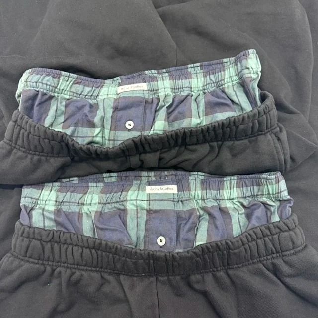 Acne Studios Layered Sweatpants with Boxers (Category: Joggers) located in Manila. Submitted by mountebanc_on_ig (Listing ID 1457450524, Image 3). Description: Acne Studios Layered Sweatpants with Boxers Sweatpants are cut to a straight fit with a mid-waist and regular length, crafted from midweight organic cotton fleece. Detailed with an integrated checked boxer waistband and a discreet logo label at the front. Complete with an elasticated draws