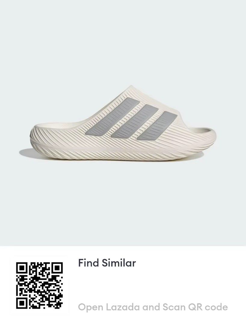 Adidas Adilette Shower Slides Beige Grey (Category: Slippers & Slides) located in Rizal. Submitted by jaimsolshop (Listing ID 1457514047, Image 2). Description: - Adidas Adilette shower slides - Light beige color - Classic grey three stripes on strap - Comfortable and easy to slip on - Ideal for casual wear or after sports - Versatile for everyday use - Last month lang nabili - With box - Almost new.
