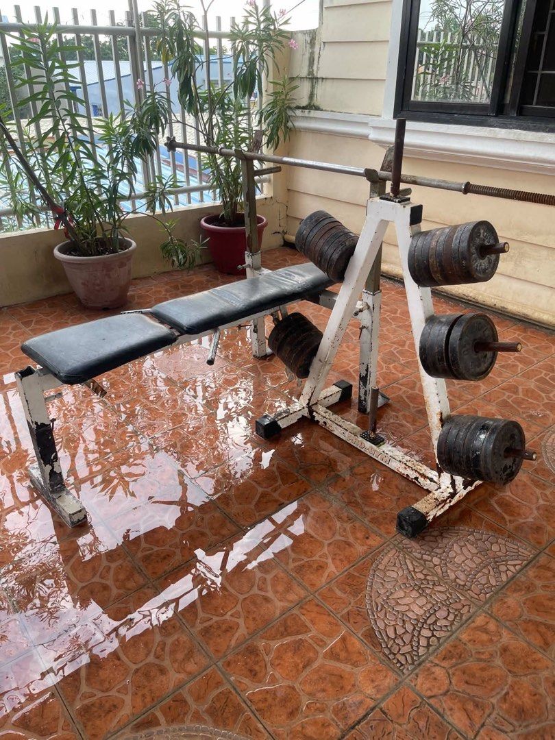 Adjustable Weight Bench with Barbell and Weights (Category: Weights & Dumbbells) located in Manila. Submitted by pinkmd (Listing ID 1457370744, Image 1). Description: Includes: 1. Bench, bar, plates rack Total of 240 Ibs plate Consists of: - 16 pcs 10 lbs - 16 pcs 5 Ibs .