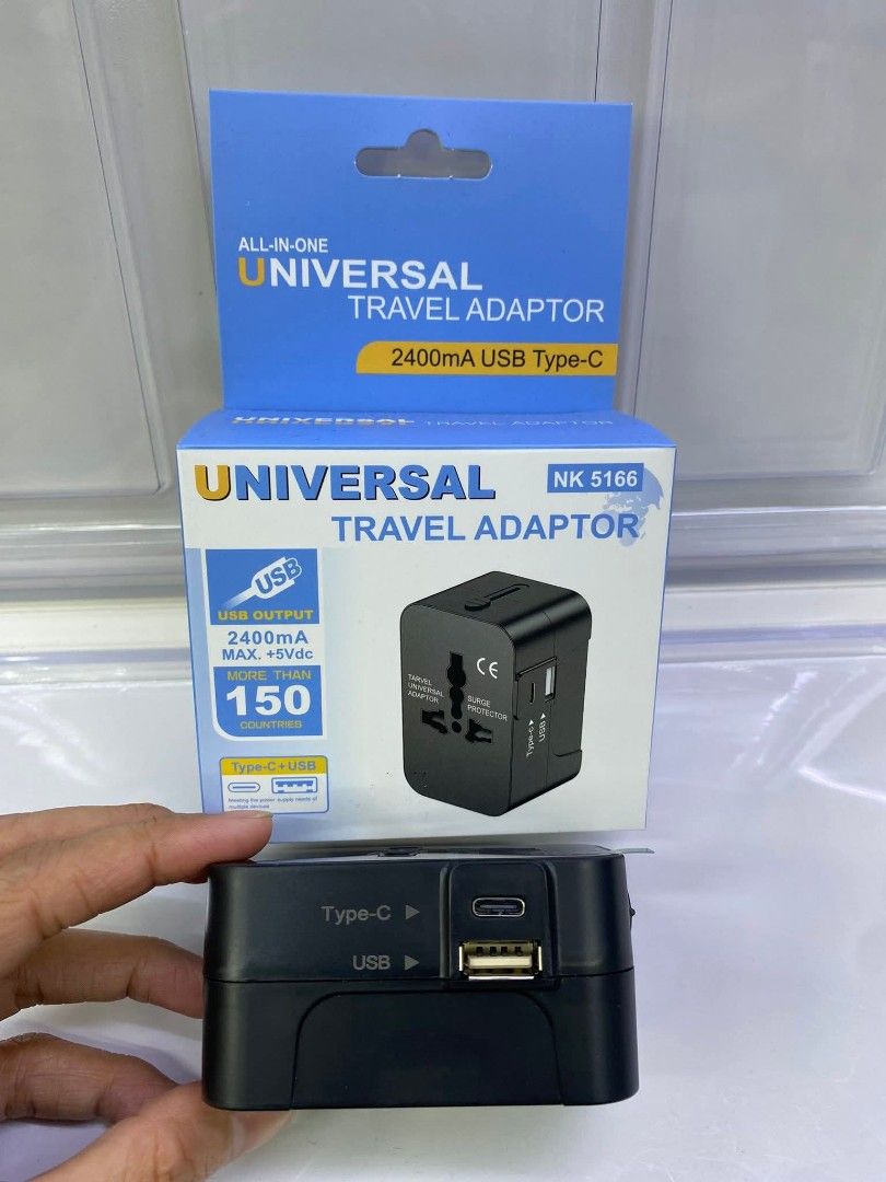 All-in-One Universal Travel Adapter with USB Type-C (Category: Cables & Adaptors) located in Manila. Submitted by iliasjen3082126 (Listing ID 1457458886, Image 1). Description: - Universal travel adapter, works in over 150 countries. - Includes USB output (2400mA max, +5Vdc) for charging devices. - Also features a USB Type-C port. - Compact and easy to carry, ideal for all your travel needs..
