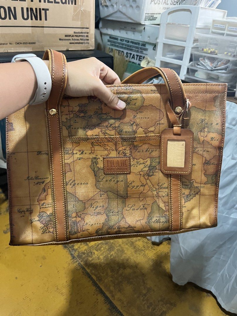 Alviero Martini Prima Classe Tote Bag (Category: Luxury Bags & Wallets) located in Manila. Submitted by rosemaryclothing (Listing ID 1457385084, Image 2). Description: Authentic Alviero Martini tote bag with signature geo map print. Features leather details and a secure zipper closure. Spacious and perfect for daily use or travel..