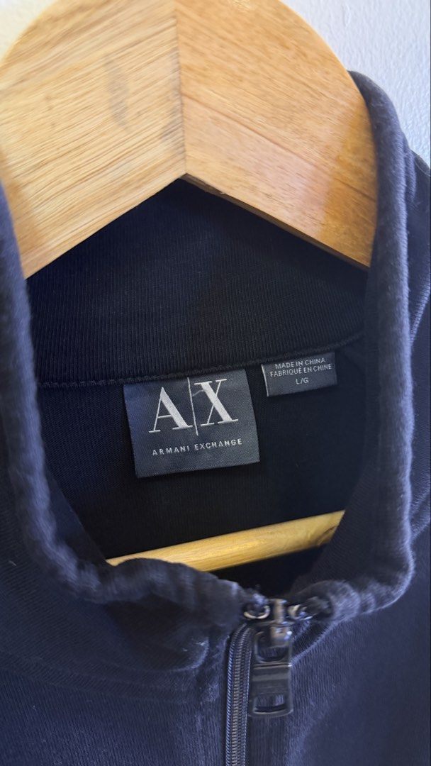 Armani Exchange AX Black Zip-Up Track Jacket L (Category: Coats, Jackets and Outerwear) located in Paranaque City. Submitted by mykapoynton (Listing ID 1457501326, Image 3). Description: Armani Exchange AX Black Zip-Up Track Jacket L - Color: Black - Size: L - Material: 100% Cotton - Features: Full zip-up front, stand-up collar, two zip pockets - Ideal for: Casual wear, light workouts.