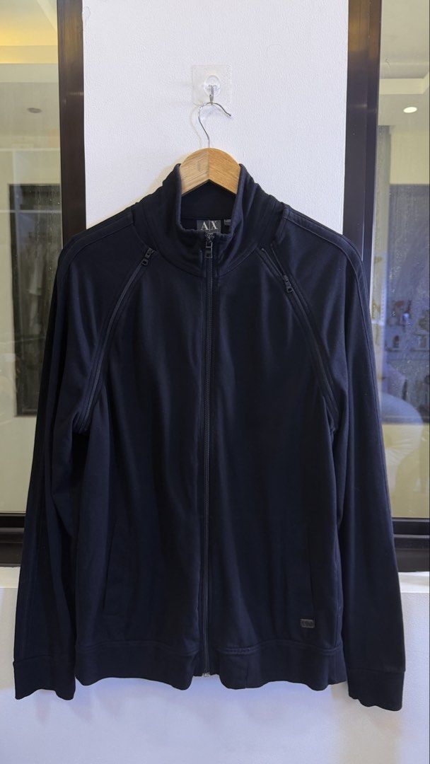 Armani Exchange AX Black Zip-Up Track Jacket L (Category: Coats, Jackets and Outerwear) located in Paranaque City. Submitted by mykapoynton (Listing ID 1457501326, Image 2). Description: Armani Exchange AX Black Zip-Up Track Jacket L - Color: Black - Size: L - Material: 100% Cotton - Features: Full zip-up front, stand-up collar, two zip pockets - Ideal for: Casual wear, light workouts.
