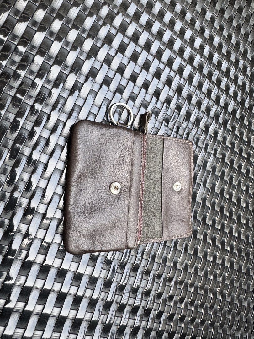 Authentic Brown Leather Coin Purse (Category: Luxury Bags & Wallets) located in Manila. Submitted by thevintage90_sretro. (Listing ID 1457415532, Image 3). Description: brown pebbled leather coin purse featuring a flap closure and a side ring attachment. legit dm.