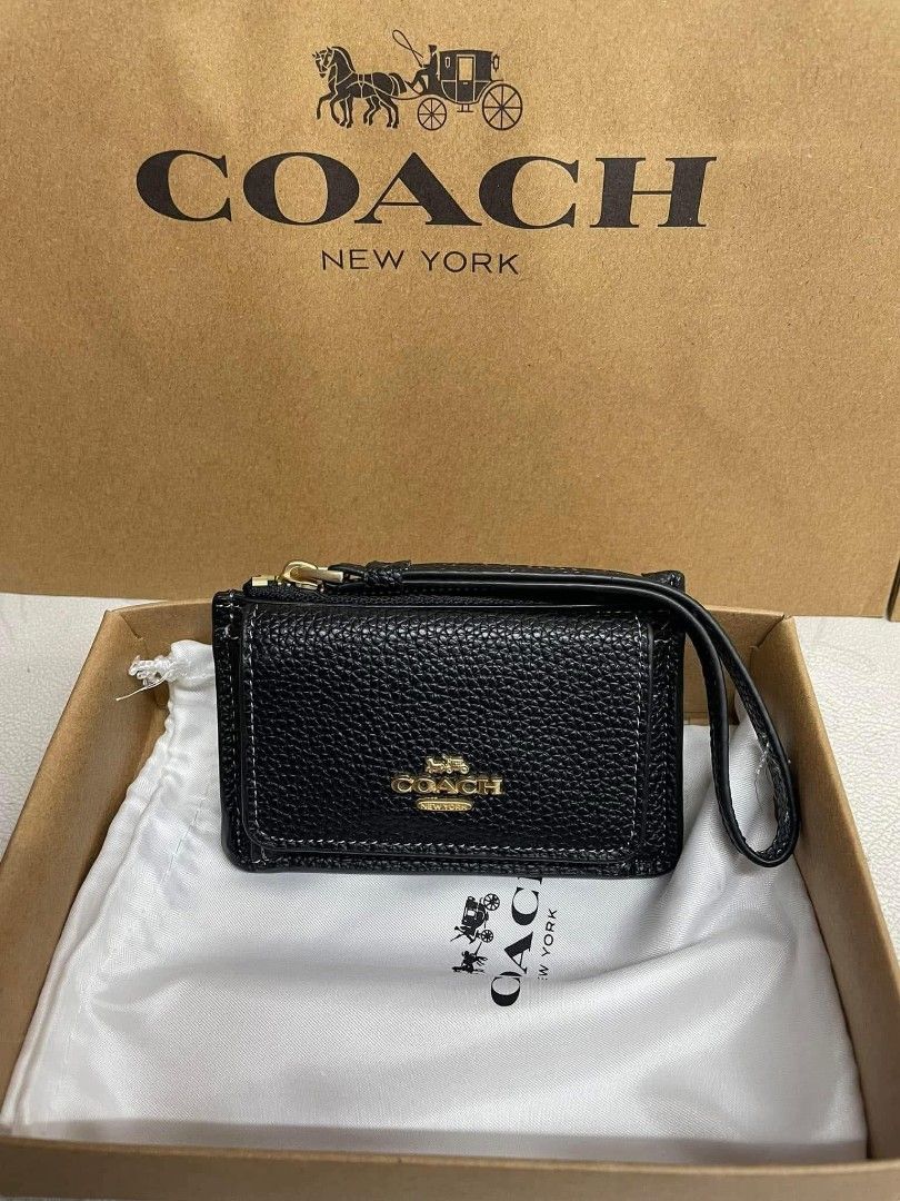 Authentic Coach Wristlet for Women (Category: Wallets & Card holders) located in Manila. Submitted by Authentic4Less_OLShop (Listing ID 1457463919, Image 3). Description: Reserve yours now!!! Super nice in actual ☺️🤩 ORIGINAL MALL PULL OUT ✅Brand new ✅ With inclusions RESELLERS ARE WELCOME!!!🥰 DISCLAIMER: authenticforless OLShop is not affiliated with any of the brands posted in this account. Copyrights and trademarks are solely of the brand ow