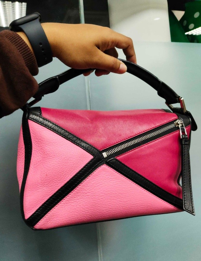 Authentic Loewe Puzzle Small Satchel Bag (Category: Luxury Bags & Wallets) located in Antipolo. Submitted by frostymmer (Listing ID 1457345446, Image 2). Description: Authentic Puzzle Bag Leather Small satchel with long strap and certificate of authenticity.