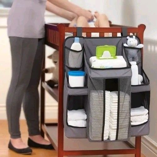 Baby Diaper Caddy Organizer for Crib or Changing Table (Category: Other Baby Bathing & Changing Needs) located in Manila. Submitted by hasylne.818 (Listing ID 1457467963, Image 2). Description: Nursery Organizer Neatly holds baby's essentials Attaches to changing tables, dressers, walls or doors P 280.