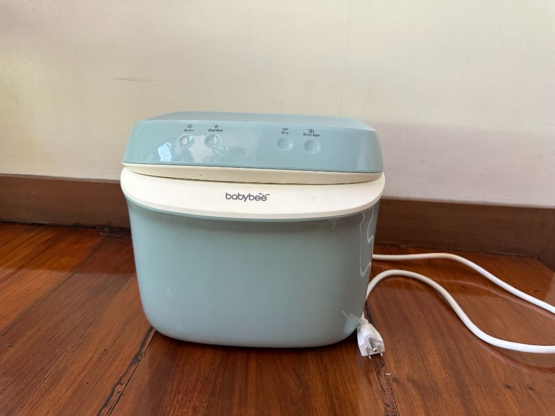 Babybee UV Sterilizer and Dryer Machine (Category: Breastfeeding & Bottle Feeding) located in Makati City. Submitted by travelfinds34611 (Listing ID 1457372022, Image 1). Description: Babybee UV Sterilizer, Pastel Blue Used 2x only, no box - Features auto, sterilize, dry, and storage modes - Works well and is clean inside - Ready for a new home .