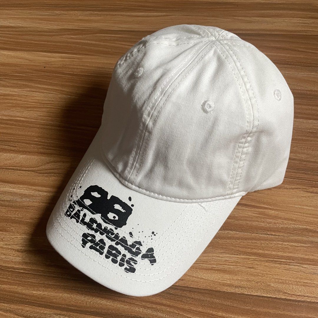 Balenciaga Hand Drawn BB Icon Velcro Tab Baseball Cap (Category: Caps & Hats) located in General Mariano Alvarez. Submitted by 4117_thriftnthrive (Listing ID 1457418037, Image 2). Description: In excellent condition No flaws Size: OSFA ₱850 Plus Shipping Fee.