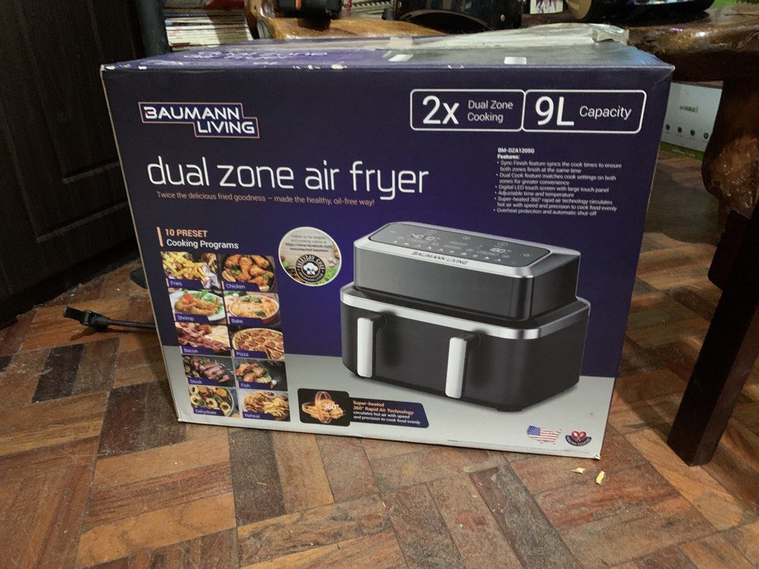 Baumann Living 9L Dual Zone Air (Category: Other Kitchen Appliances) located in Paranaque City. Submitted by cheska.zaldivar (Listing ID 1457487108, Image 1). Description: Baumann Living Dual Zone Air Fryer 9L 🍗✨ BRAND NEW / NEVER USED! 📦✨ Selling a Baumann Living Dual Zone Air Fryer with 9L total capacity, perfect for preparing two dishes at the same time. ✨ Features: • 9L capacity • Dual Zone cooking • 10 preset cooking programs • 360° rapid 