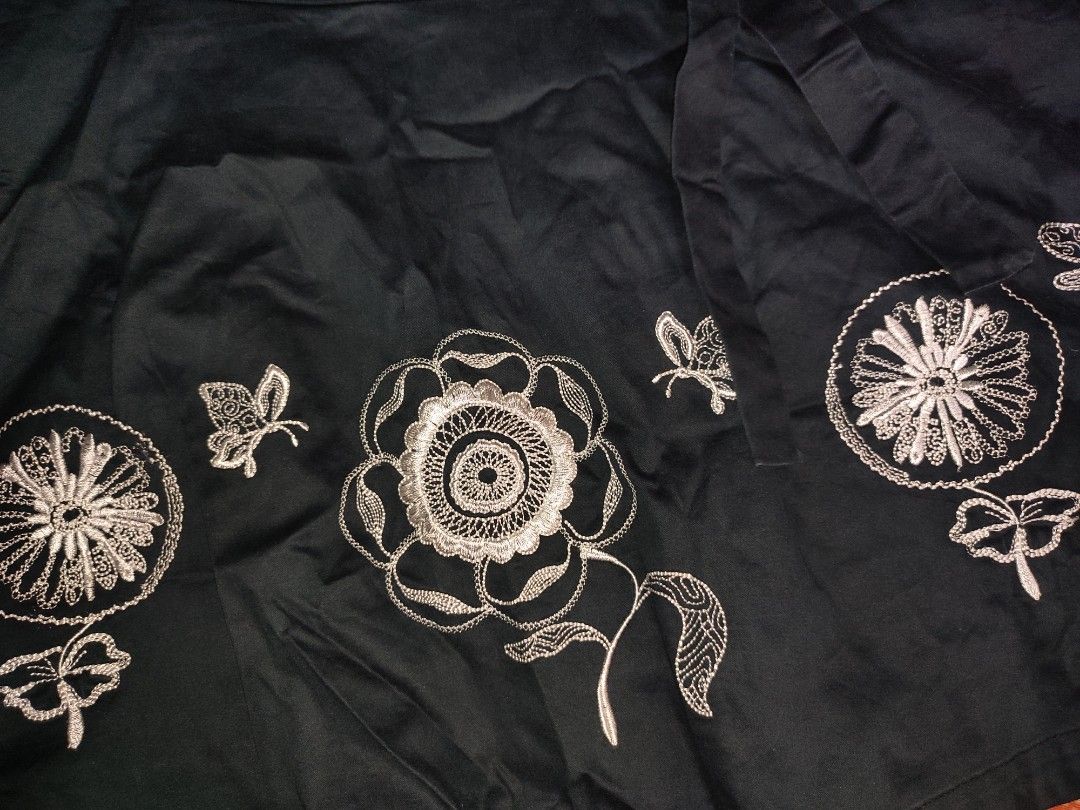 Black A-line Skirt with White Floral Embroidery (Category: Skirts) located in Caloocan City. Submitted by faesrie (Listing ID 1457504390, Image 2). Description: - 27-28 inches waist - 19 inches length - Cute black A-line skirt - Features white floral and butterfly embroidery - Hits above the knee - Side tie detail for adjustable fit - Versatile for casual or dressed-up looks - Easy to pair with various tops.