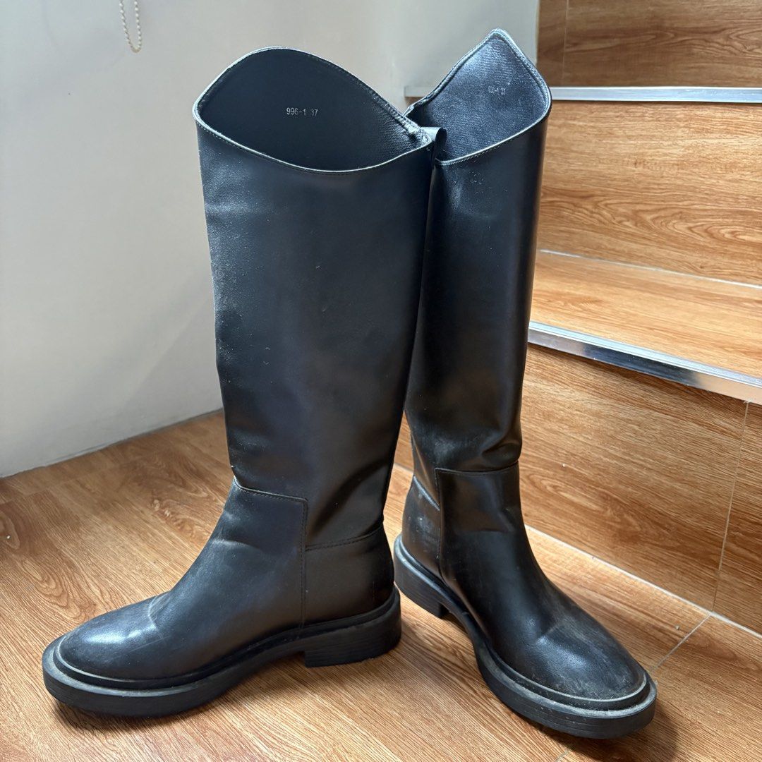Jil Sander Black Leather Knee-High Boots (Category: Boots) located in Navotas City. Submitted by kathyp10 (Listing ID 1457378403, Image 2). Description: Jil Sander Women’s Leather Riding Boots Bought in Hong Kong Color: Black -Price negotiable for sure buyers MOP: Gcash, GoTyme MOD: Lalamove, J&T.