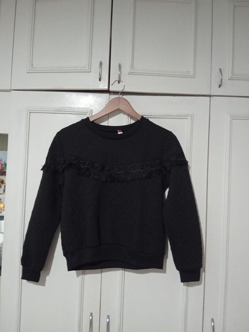 Black Quilted Sweatshirt with Lace Trim (Category: Coats, Jackets and Outerwear) located in Quezon City. Submitted by taba0912 (Listing ID 1457419487, Image 1). Description: - Black long-sleeved sweatshirt - All-over quilted pattern - Pretty lace trim around neckline and shoulders - Ribbed cuffs and hem - Comfortable and stylish design - Ideal for casual wear.