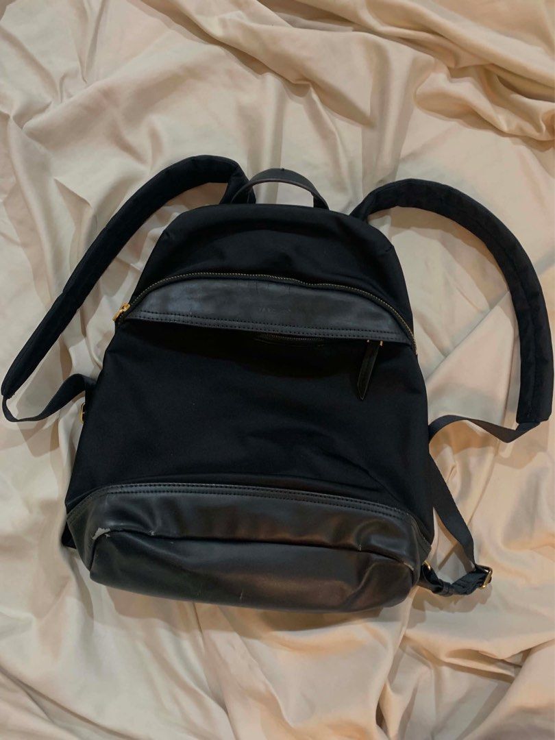 Black Targus Backpack with Leather Accents (Category: Backpacks) located in Quezon City. Submitted by ramonespinas (Listing ID 1457366628, Image 3). Description: - Classic black backpack - Leather trim on front pocket and base - Zippers in good working condition - Adjustable straps - Some wear on leather at bottom corners - Spacious interior for essentials - Ideal for school or everyday use.