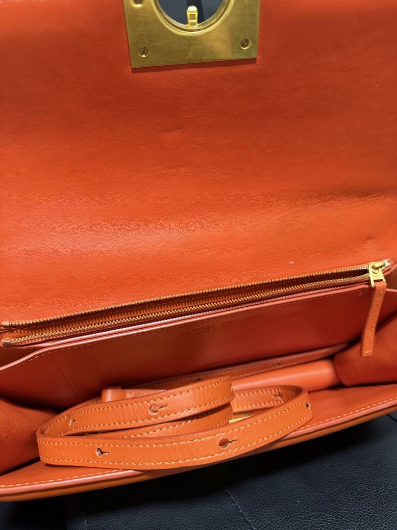 Bottega V sling/clutch (Category: Luxury Bags & Wallets) located in Antipolo. Submitted by declutteringirlie0317 (Listing ID 1457445794, Image 3). Description: -used once -perfect for events -can be worn as sling/cluth/shoulder bag -gold hardware lock -rare vintage -bought from Japan seller.