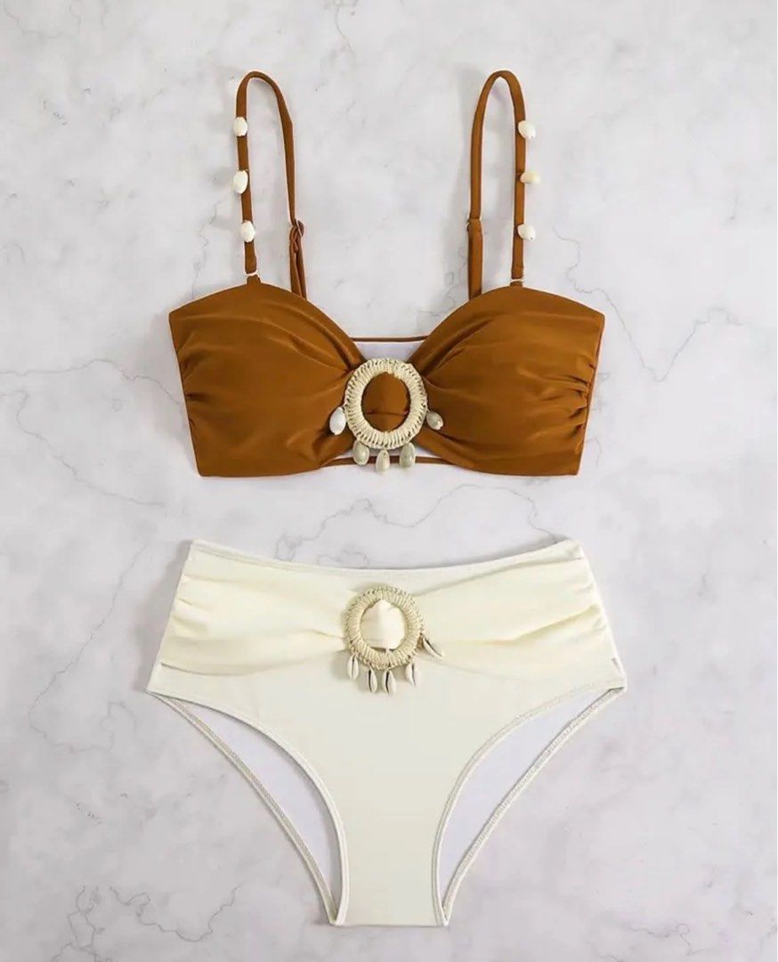 Brown & Cream High Waisted Bikini with Shell Detail (Category: Bikinis & Swimsuits) located in Pasig City. Submitted by Declutterwithme0831 (Listing ID 1457345788, Image 2). Description: - Cute bikini set - Brown ruched bikini top with shell and ring detail - Matching cream high-waisted bottoms - Both pieces feature shell and ring detail - Ideal for beach or pool - Perfect for your next vacation!.