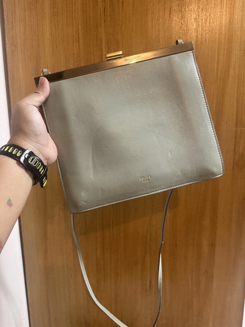 Celine Paris Leather Shoulder Bag (Category: Luxury Bags & Wallets) located in Pasig City. Submitted by zelinavillaflor (Listing ID 1457460019, Image 1). Description: - Light grey Celine shoulder bag - Genuine leather material - Elegant gold hardware - Adjustable long strap for comfortable wear - Chic clasp closure detail - Pristine and clean interior - Versatile for everyday or special events - A timeless Celine classic.
