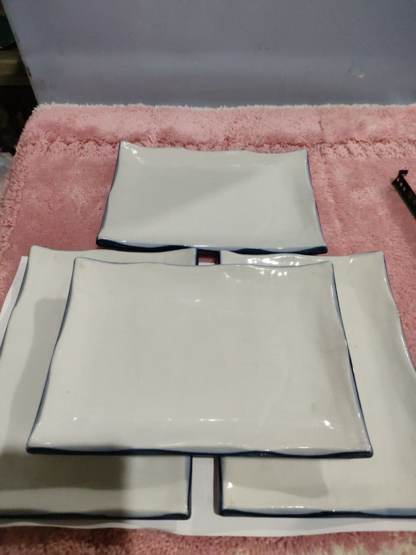 Ceramic rectangular serving plates (Category: Dinnerware & Cutlery) located in Bulacan. Submitted by hunterherojapanjdm (Listing ID 1457498749, Image 1). Description: Set of white ceramic rectangular serving plates with distinct uneven blue rims..